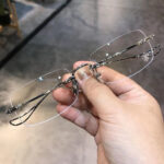 Silver frameless square blue light glasses